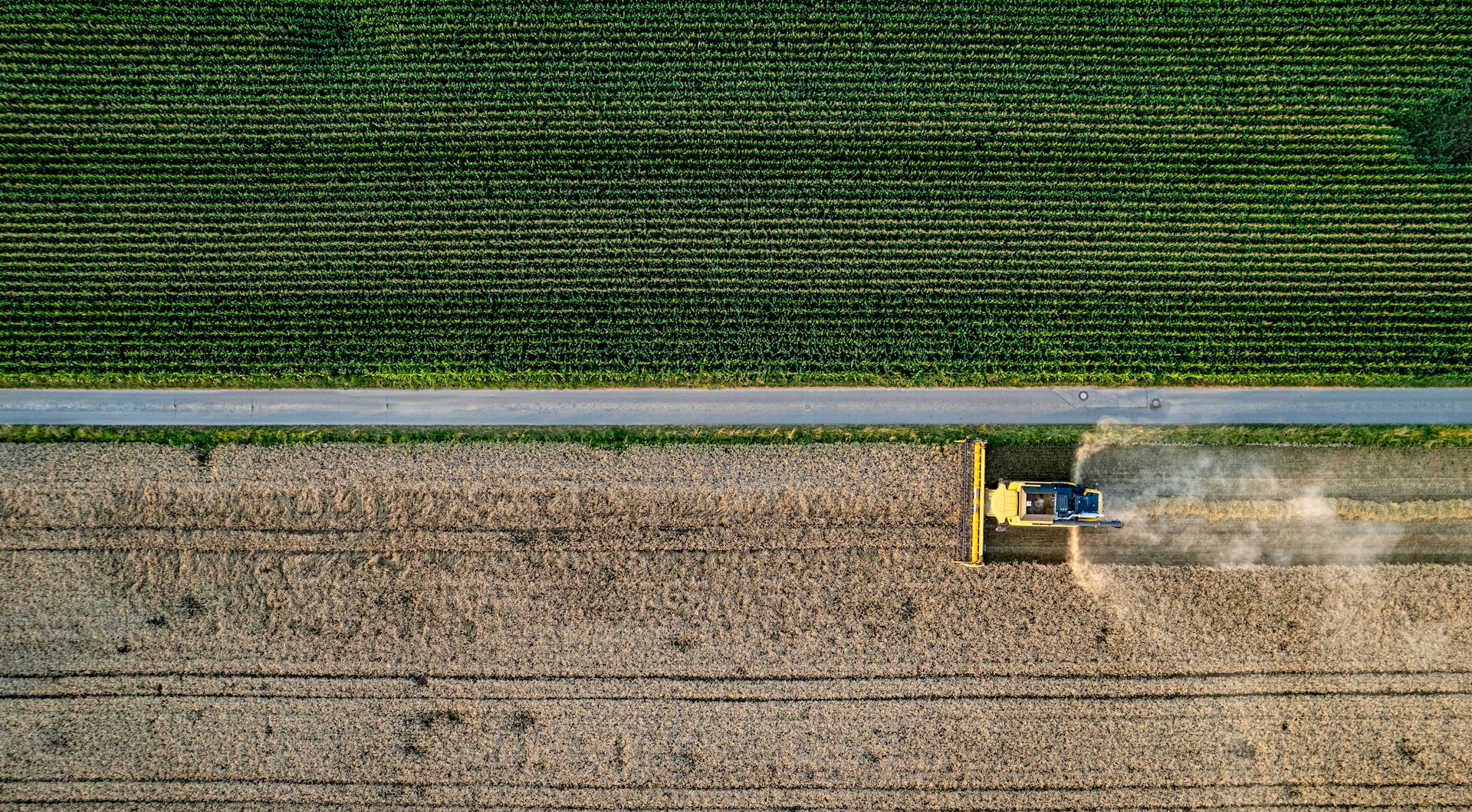 An aerial view of a tractor in a field